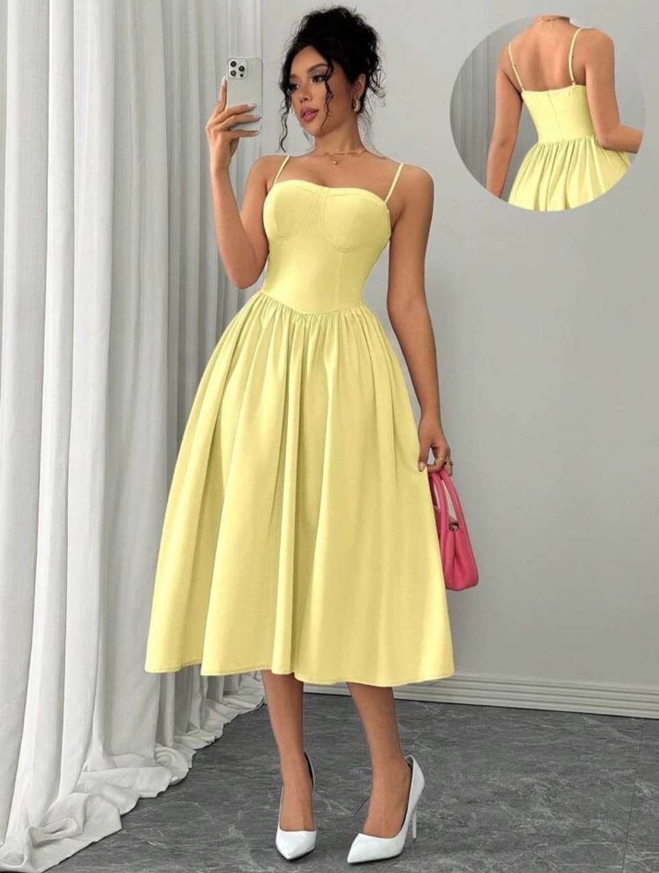 Vestido midi amarillo con tirantes y falda plisada